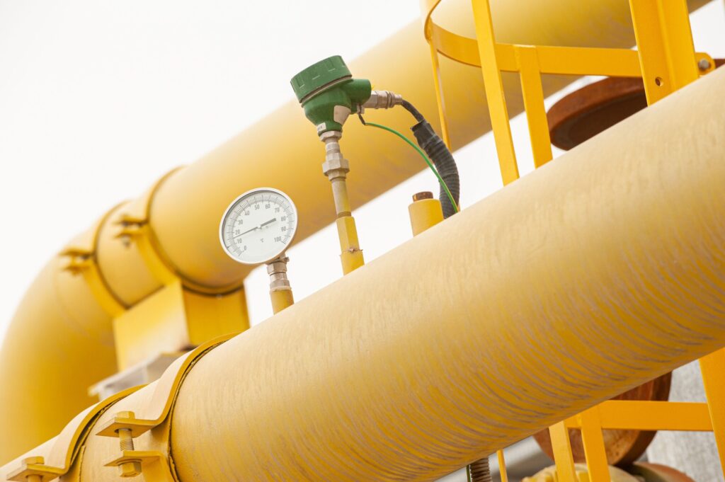 Pressure gauge on reciprocating compressor, monitoring air pressure for industrial processes
