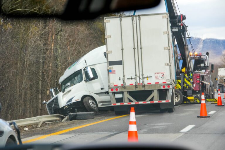 Semi truck accident on interstate highway and recovery equipment