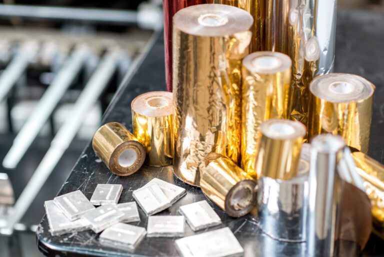 Foil rolls and sealer machines for packaging technology
